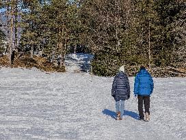 Winter Walkers In The Bavarian Municipality Kruen