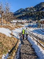 Winter Walkers In The Bavarian Municipality Kruen