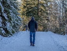 Winter Walkers In The Bavarian Municipality Kruen