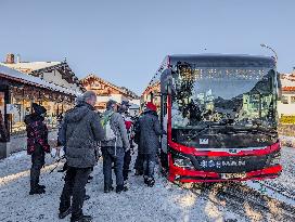 Hikers Boarding A Bus In Kruen