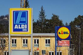 Supermarket Signs For Aldi And Lidl In A Small Municipality In The Upper Bavarian District Of Garmisch-Partenkirchen