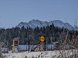 Supermarket Signs For Aldi And Lidl In A Small Municipality In The Upper Bavarian District Of Garmisch-Partenkirchen