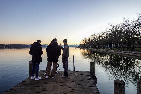 People Enjoying A Winter Evening At Lake Starnberg