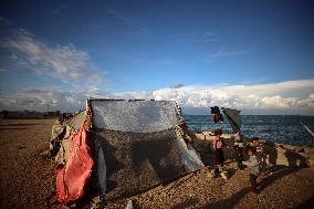 Displaced Palestinians On The Shore Of Khan Younis