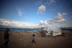 Displaced Palestinians On The Shore Of Khan Younis