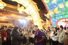 Tourists view lanterns at the Confucius Temple in Nanjing