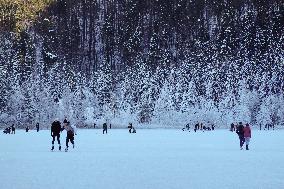 Outdoor Activities On The Frozen Bavarian Lake Schwansee