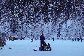 Outdoor Activities On The Frozen Bavarian Lake Schwansee