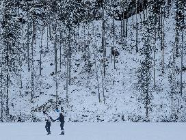 Outdoor Activities On The Frozen Bavarian Lake Schwansee