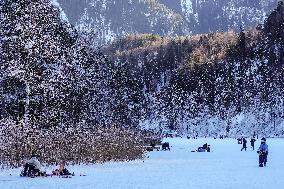 Outdoor Activities On The Frozen Bavarian Lake Schwansee