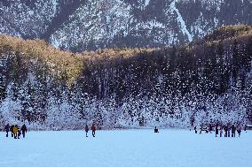 Outdoor Activities On The Frozen Bavarian Lake Schwansee