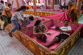 Thai People Lie In Coffins To Welcome The New Year.