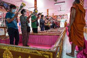 Thai People Lie In Coffins To Welcome The New Year.