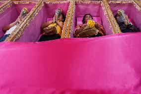 Thai People Lie In Coffins To Welcome The New Year.