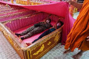 Thai People Lie In Coffins To Welcome The New Year.