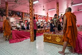 Thai People Lie In Coffins To Welcome The New Year.