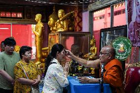 Thai People Lie In Coffins To Welcome The New Year.