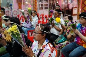 Thai People Lie In Coffins To Welcome The New Year.