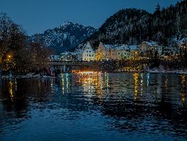 New Year's Torchlight Swim In The Bavarian River Lech In Fuessen