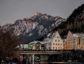 New Year's Torchlight Swim In The Bavarian River Lech In Fuessen