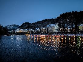 New Year's Torchlight Swim In The Bavarian River Lech In Fuessen