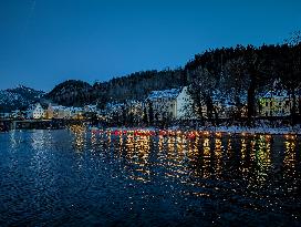 New Year's Torchlight Swim In The Bavarian River Lech In Fuessen