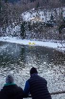 Senior Citizens Reflecting On The New Year By The Water