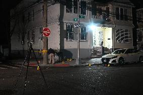 NYPD Crime Scene Investigators Photograph And Collect Evidence At Nightclub Mass Shooting In Queens New York City