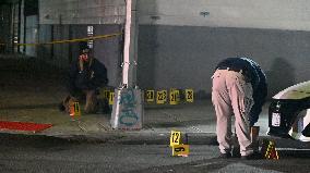 NYPD Crime Scene Investigators Photograph And Collect Evidence At Nightclub Mass Shooting In Queens New York City