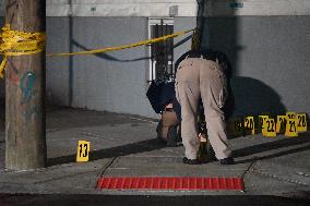 NYPD Crime Scene Investigators Photograph And Collect Evidence At Nightclub Mass Shooting In Queens New York City