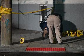 NYPD Crime Scene Investigators Photograph And Collect Evidence At Nightclub Mass Shooting In Queens New York City