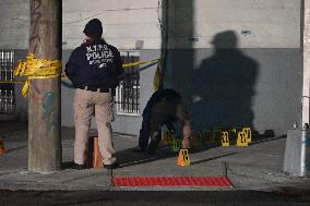 NYPD Crime Scene Investigators Photograph And Collect Evidence At Nightclub Mass Shooting In Queens New York City