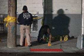 NYPD Crime Scene Investigators Photograph And Collect Evidence At Nightclub Mass Shooting In Queens New York City