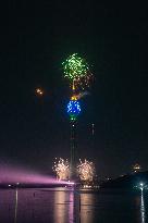 Fireworks Light Up The Sky Near Lotus Tower On New Year's Eve 2025