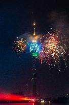 Fireworks Light Up The Sky Near Lotus Tower On New Year's Eve 2025