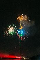 Fireworks Light Up The Sky Near Lotus Tower On New Year's Eve 2025