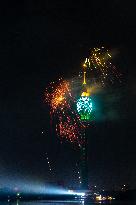 Fireworks Light Up The Sky Near Lotus Tower On New Year's Eve 2025