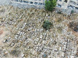 Grave Exhumations In Yarmouk Camp Cemetery: A Search For Israeli Remains