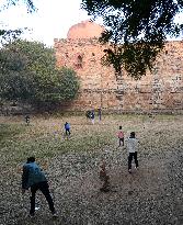 Kids Play Cricket At Mughal Era Monument In Delhi