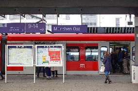 Passengers Waiting For Their Train At Munich East Station