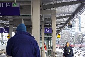 Passengers Waiting For Their Train At Munich East Station