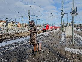 Passengers Waiting For Their Train At Munich East Station