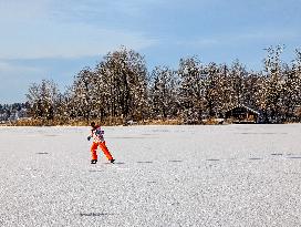 Ice Skating On Frozen Bavarian Lake Staffelsee