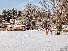 Ice Skating On Frozen Bavarian Lake Staffelsee