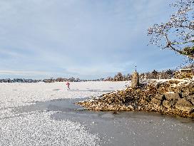 Ice Skating On Frozen Bavarian Lake Staffelsee