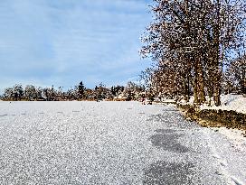 Ice Skating On Frozen Bavarian Lake Staffelsee