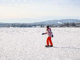 Ice Skating On Frozen Bavarian Lake Staffelsee