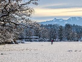 Ice Skating On Frozen Bavarian Lake Staffelsee