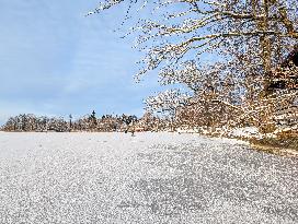 Ice Skating On Frozen Bavarian Lake Staffelsee