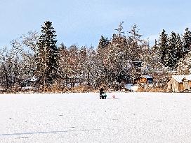 Ice Skating On Frozen Bavarian Lake Staffelsee